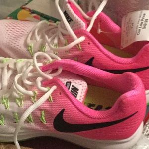 Nike Zoom sneakers white and fluorescent pink.